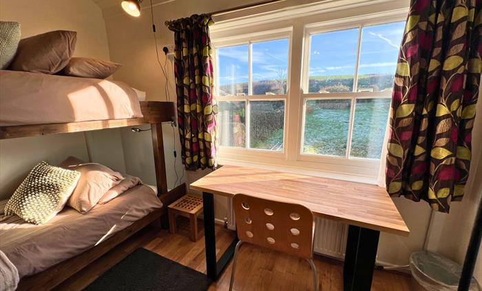 Bedroom 4 - family room - garden view